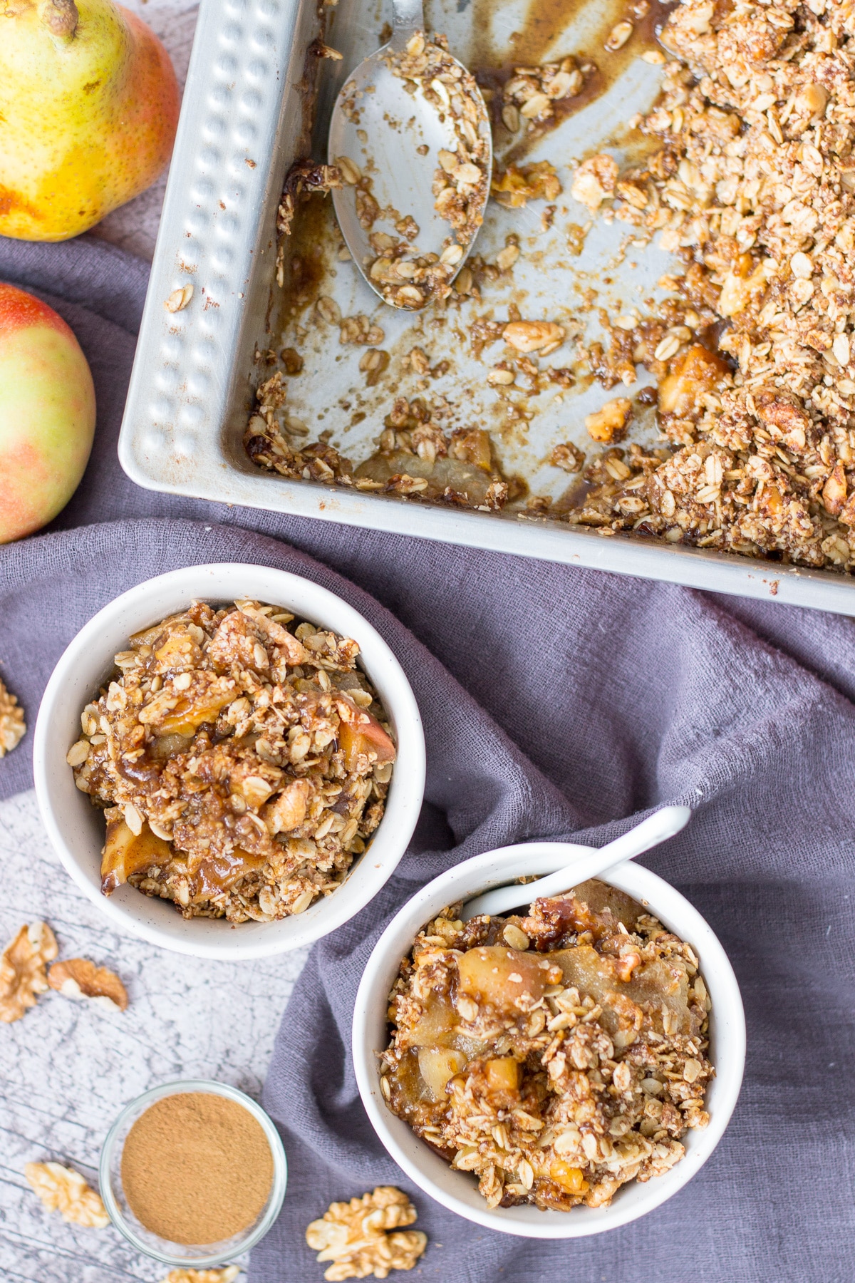 Apple Pear Crisp served in a bowl with a spoon