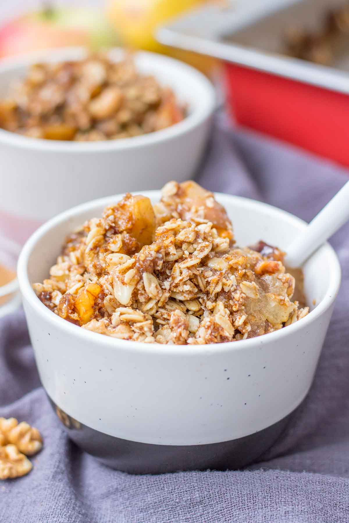 Apple Pear Crisp served in a bowl with a spoon