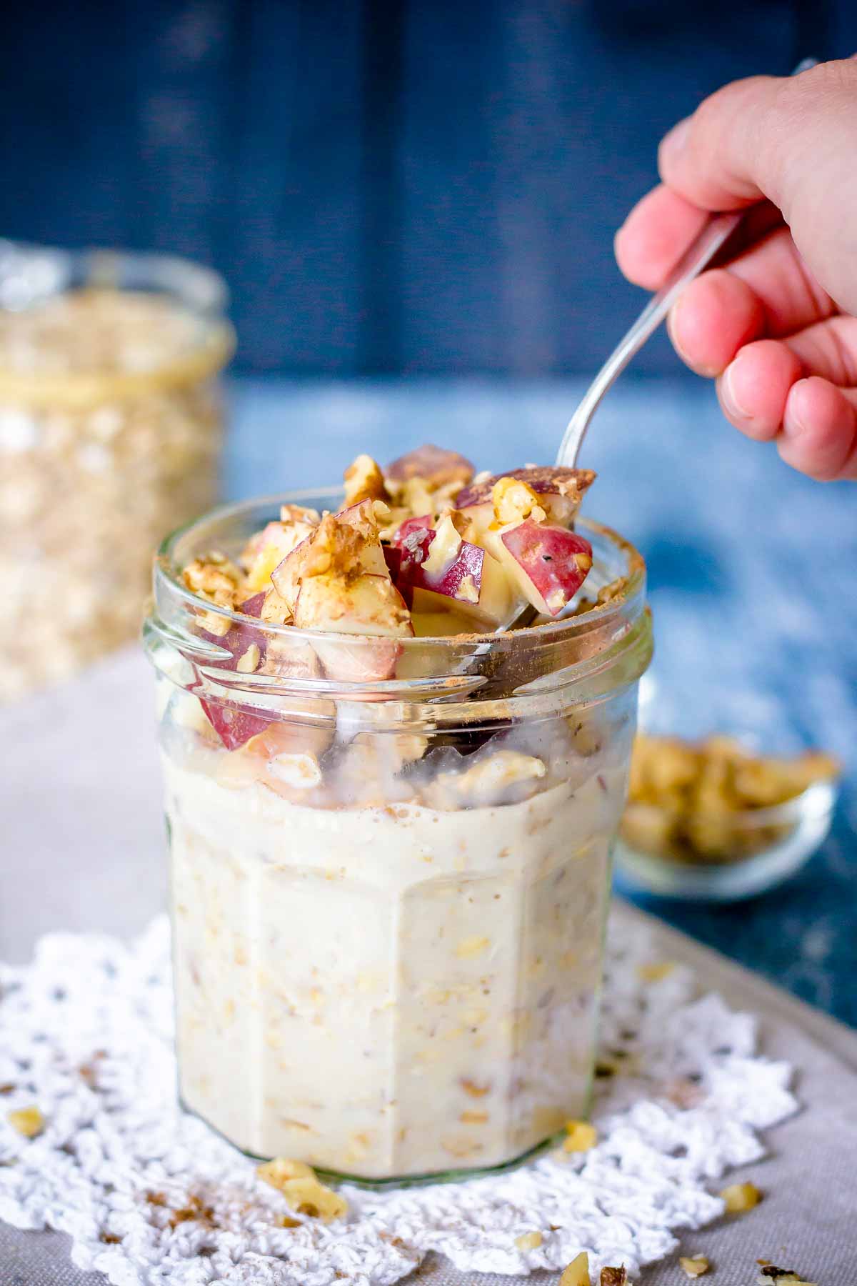 Peach Overnight Oats served in a glass jar