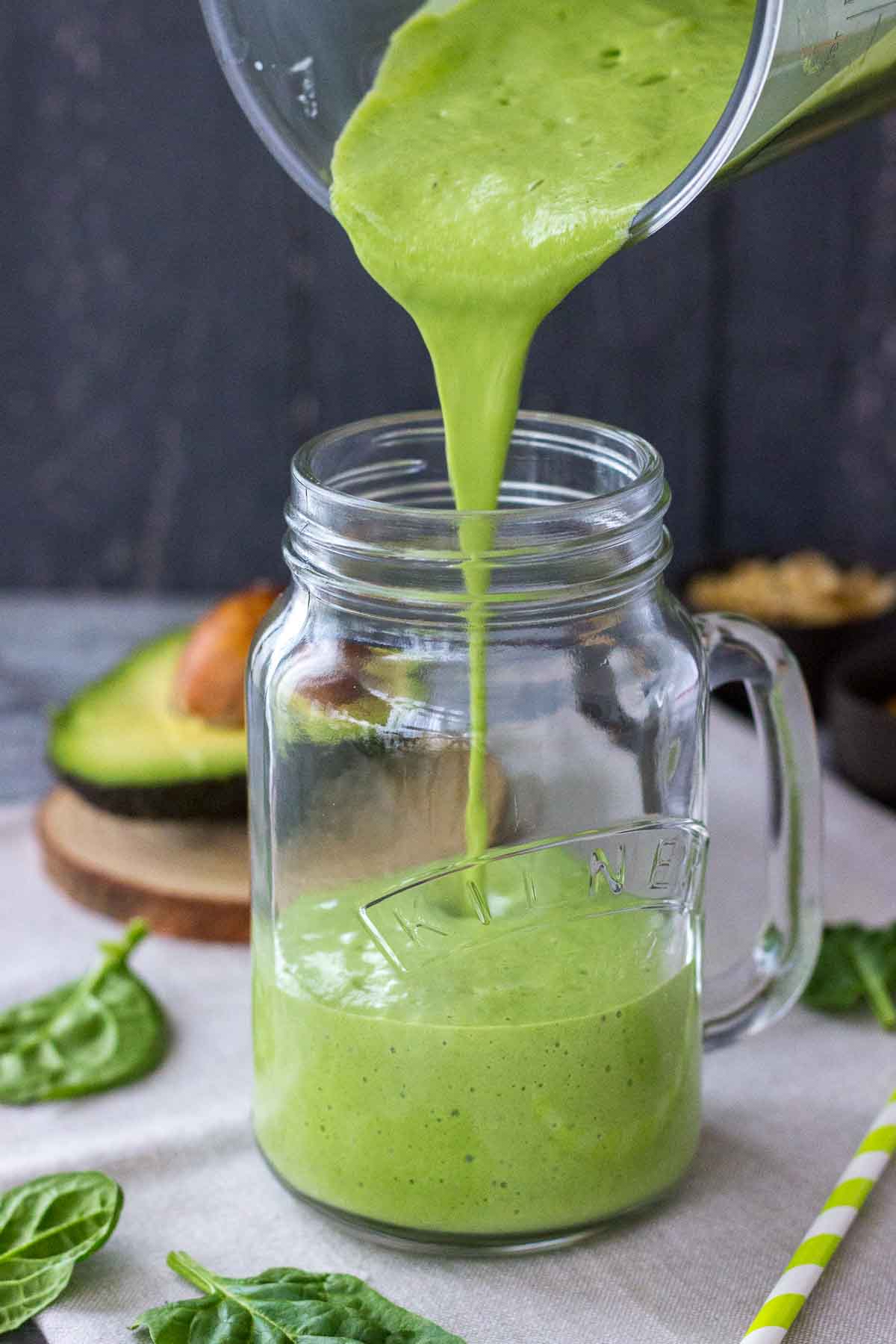 Pouring Avocado Smoothie in a glass