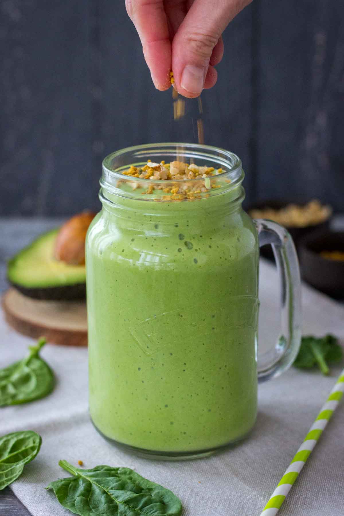 Topping Avocado smoothie with walnuts